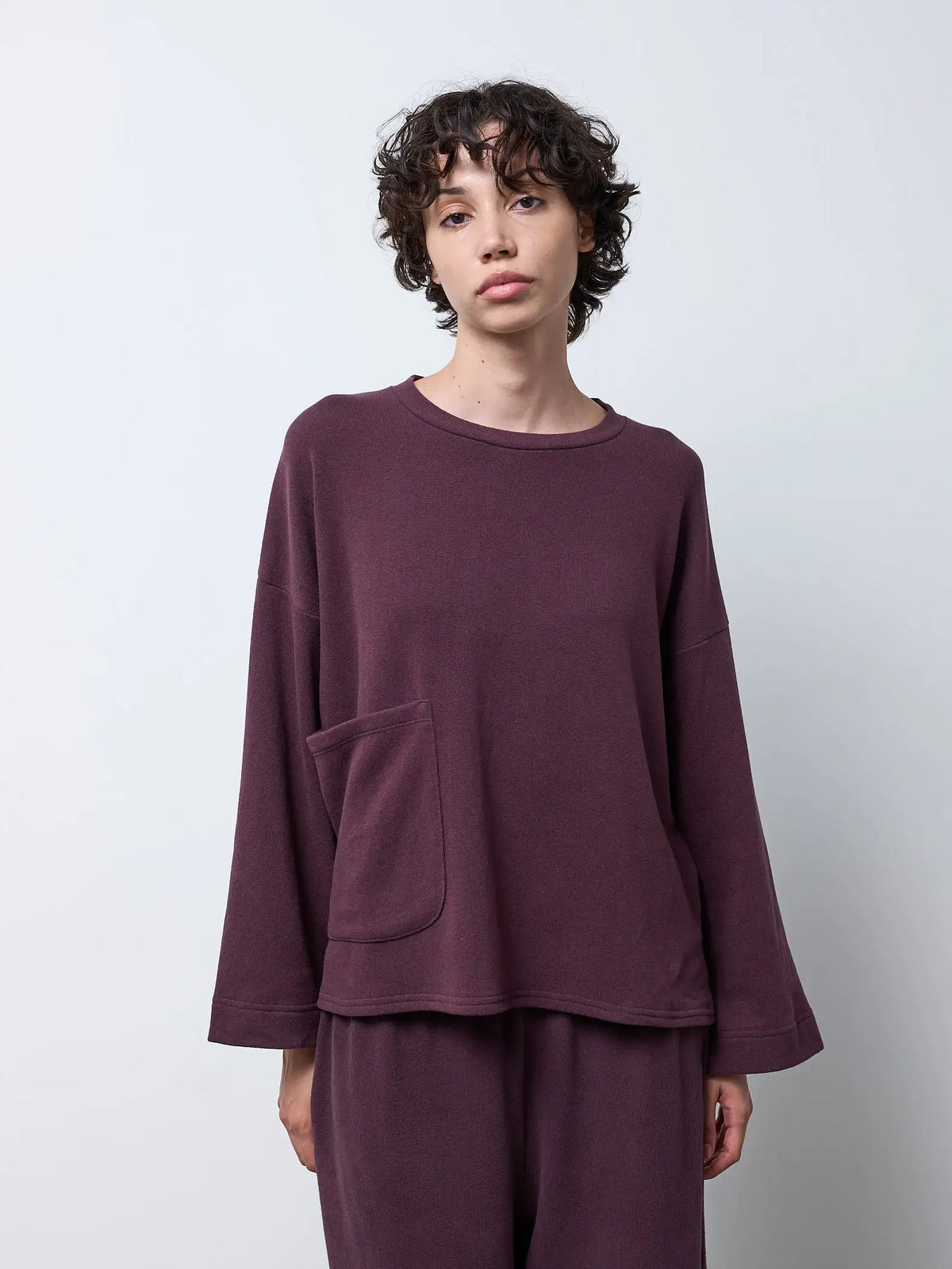 Maglia con tasca e maniche ampie