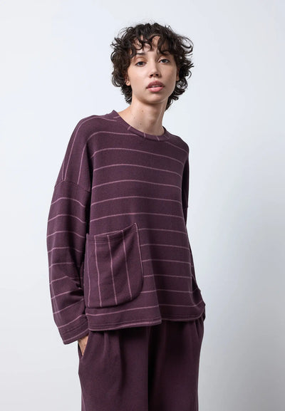 Maglia con tasca e maniche ampie — FIG