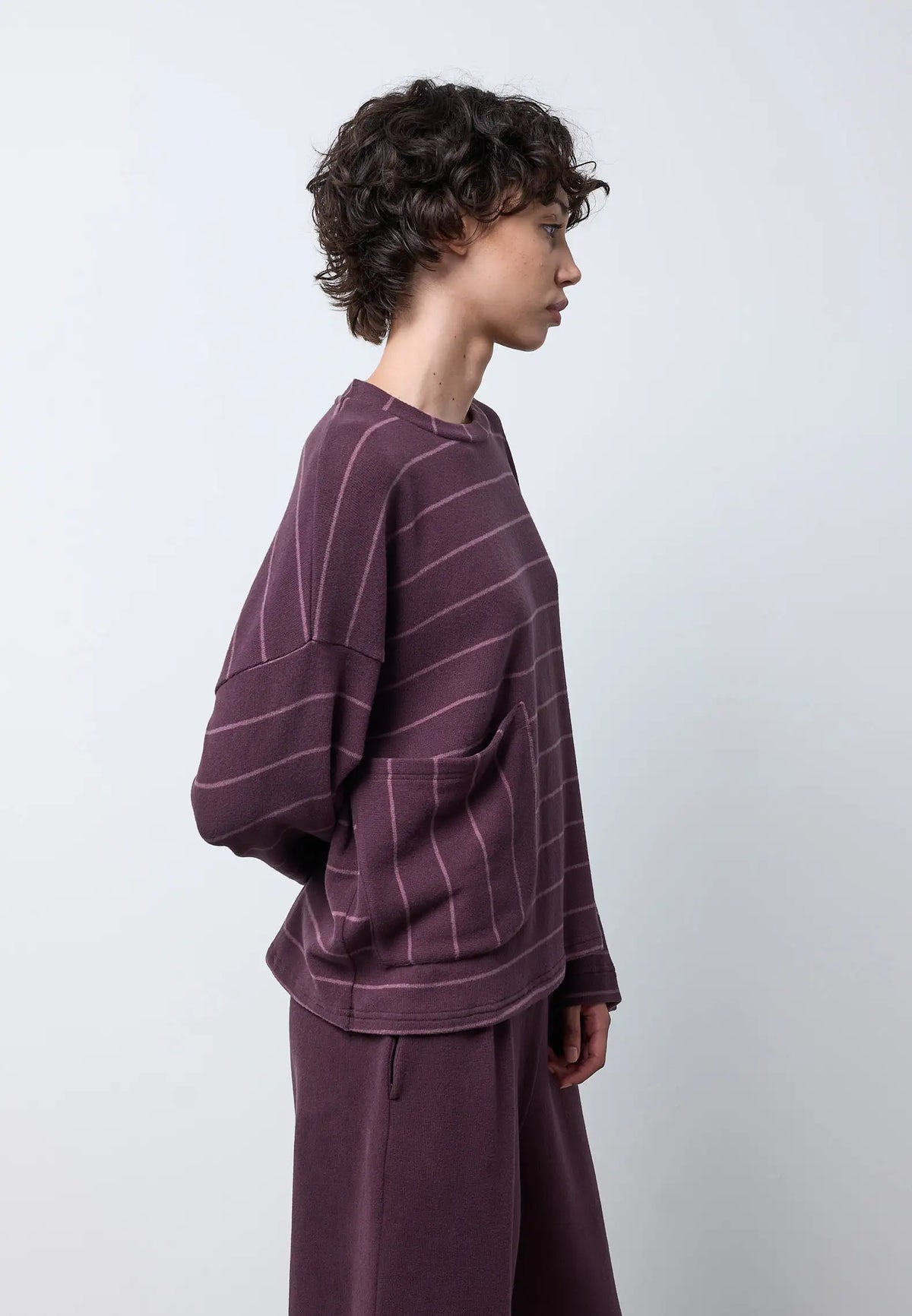 Maglia con tasca e maniche ampie — FIG